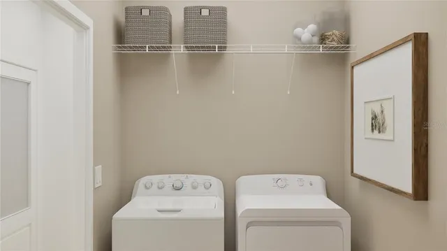 a utility room with dryer and washer