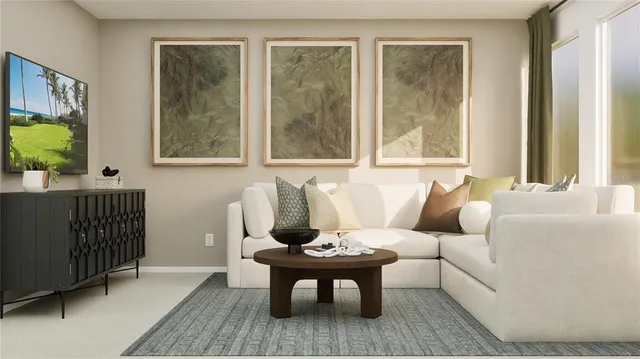 a living room with furniture and a window