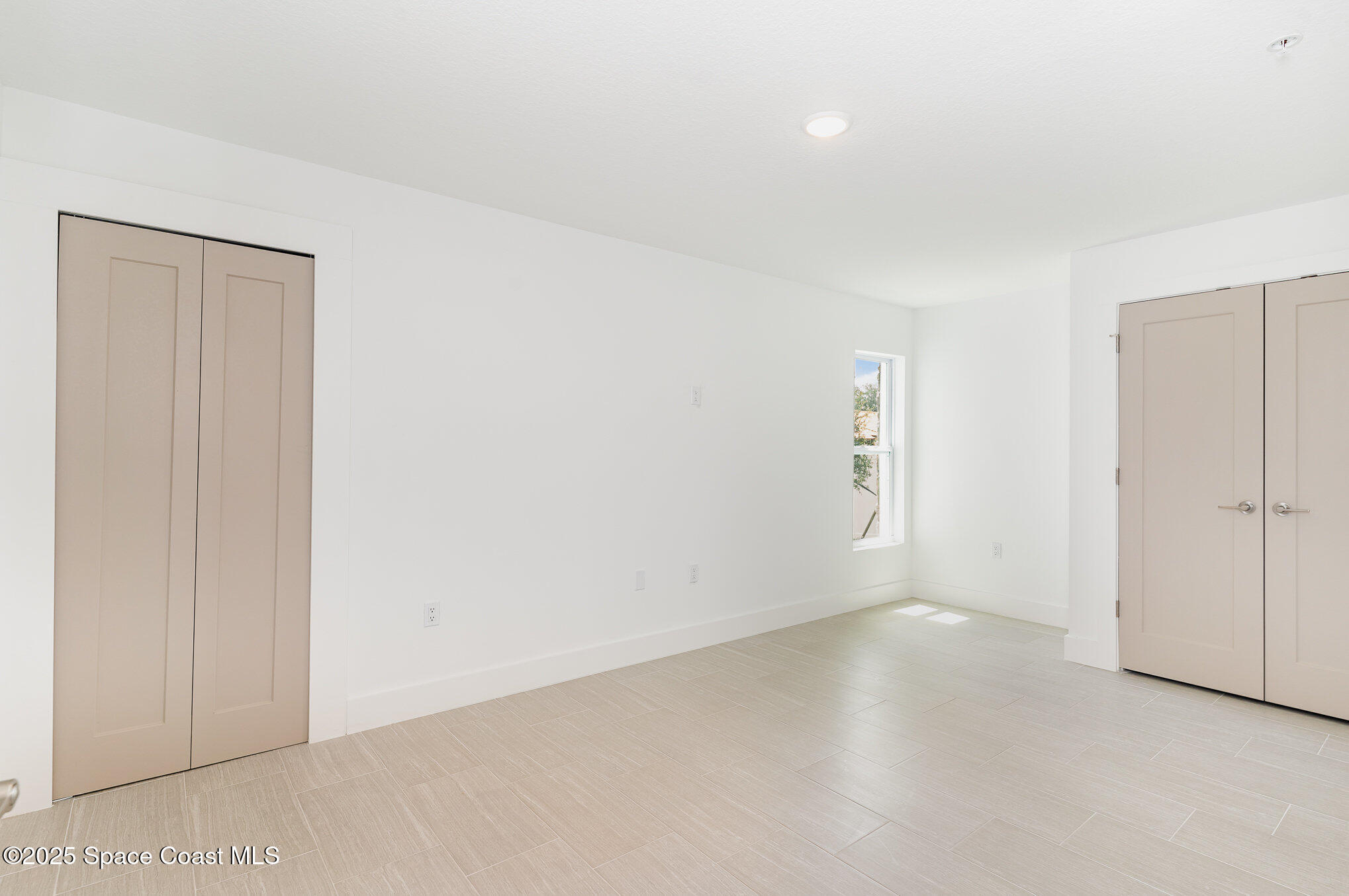 1625 Par Street, Unit 1104 Palm Bay, FL 32905 - Photo 15 of 32 an empty room with an entryway