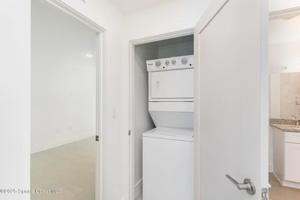 a view of a room with racks on the wall