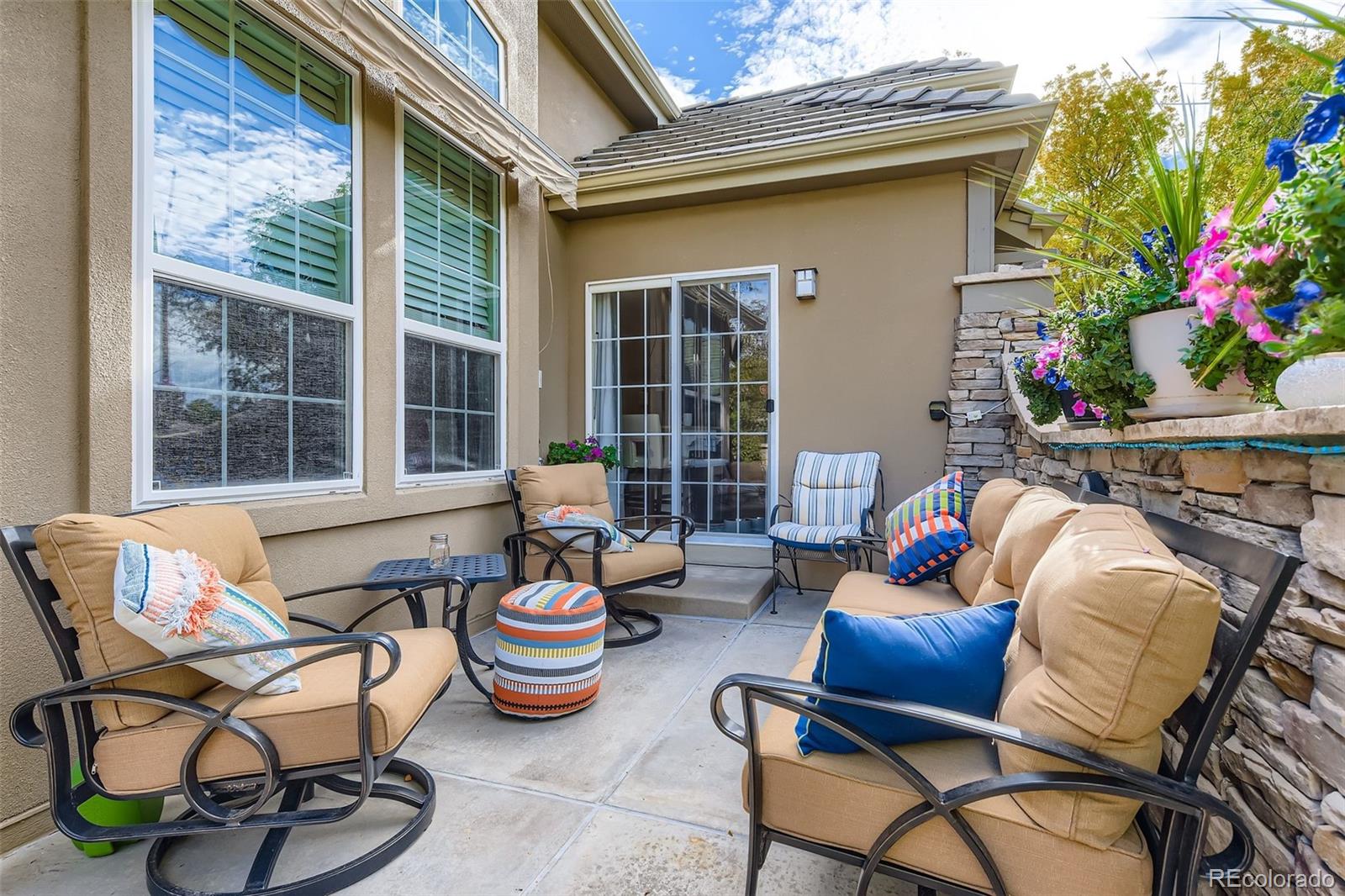 9006 Old Tom Morris Circle Highlands Ranch, CO 80129 - Photo 29 of 41 a outdoor living space with furniture and potted plants