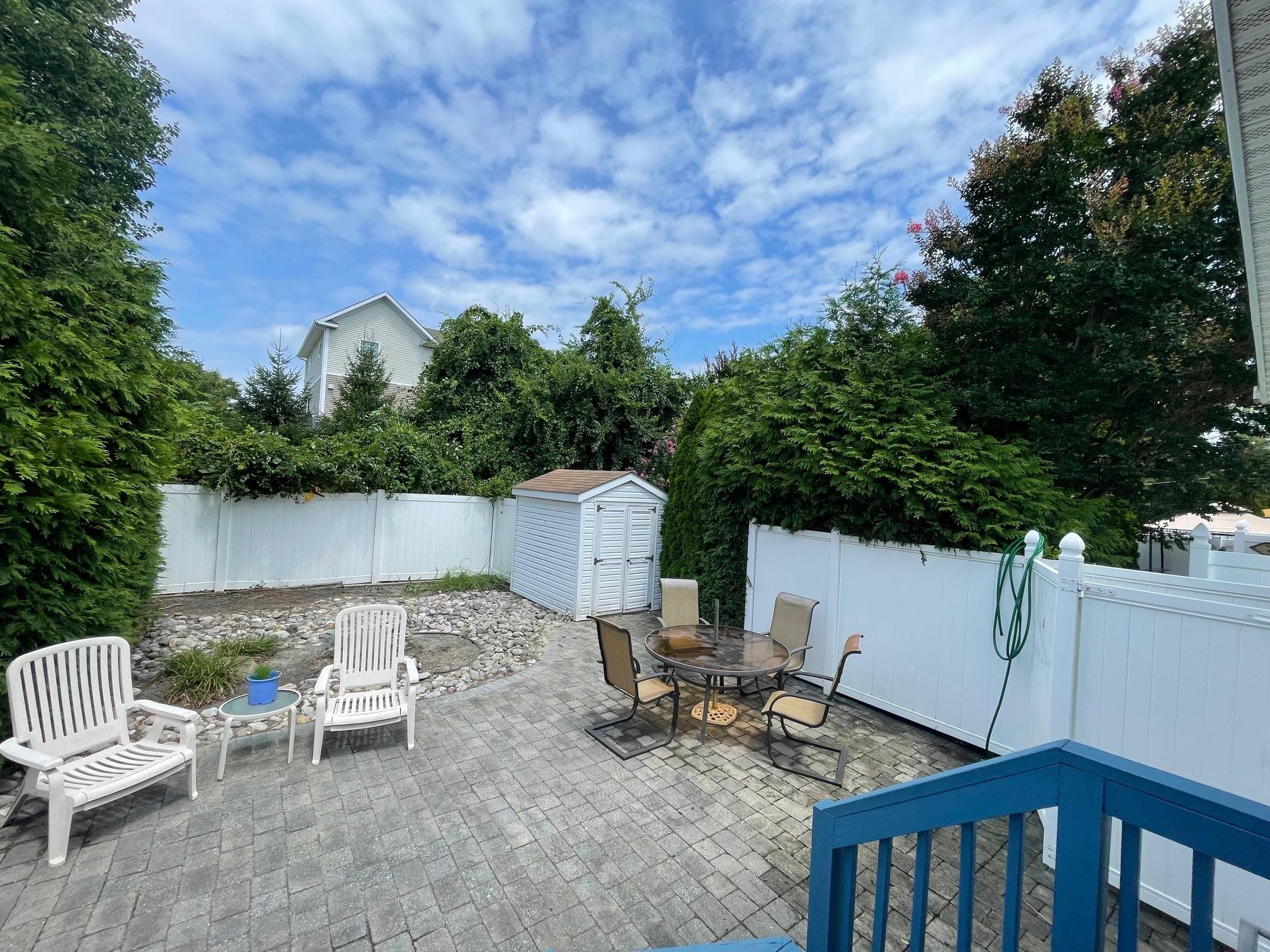 4100 Rte 9 South, Unit 9 Rio Grande, NJ 08242 - Photo 20 of 31 a view of backyard with seating space and trees