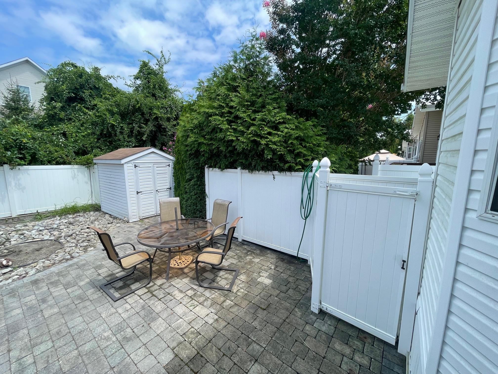 4100 Rte 9 South, Unit 9 Rio Grande, NJ 08242 - Photo 21 of 31 a view of a backyard with furniture and a cabin