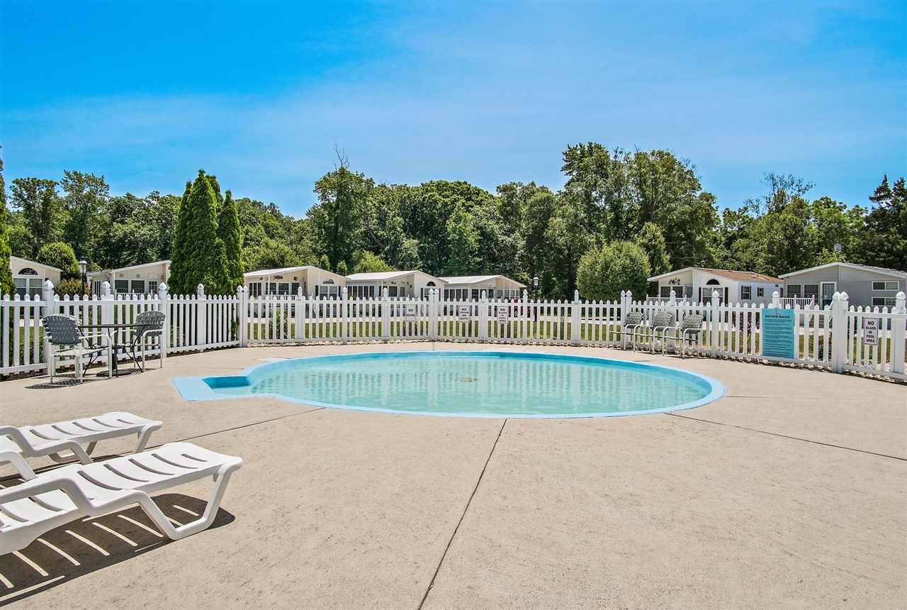 4100 Rte 9 South, Unit 9 Rio Grande, NJ 08242 - Photo 29 of 31 a view of a swimming pool with a patio