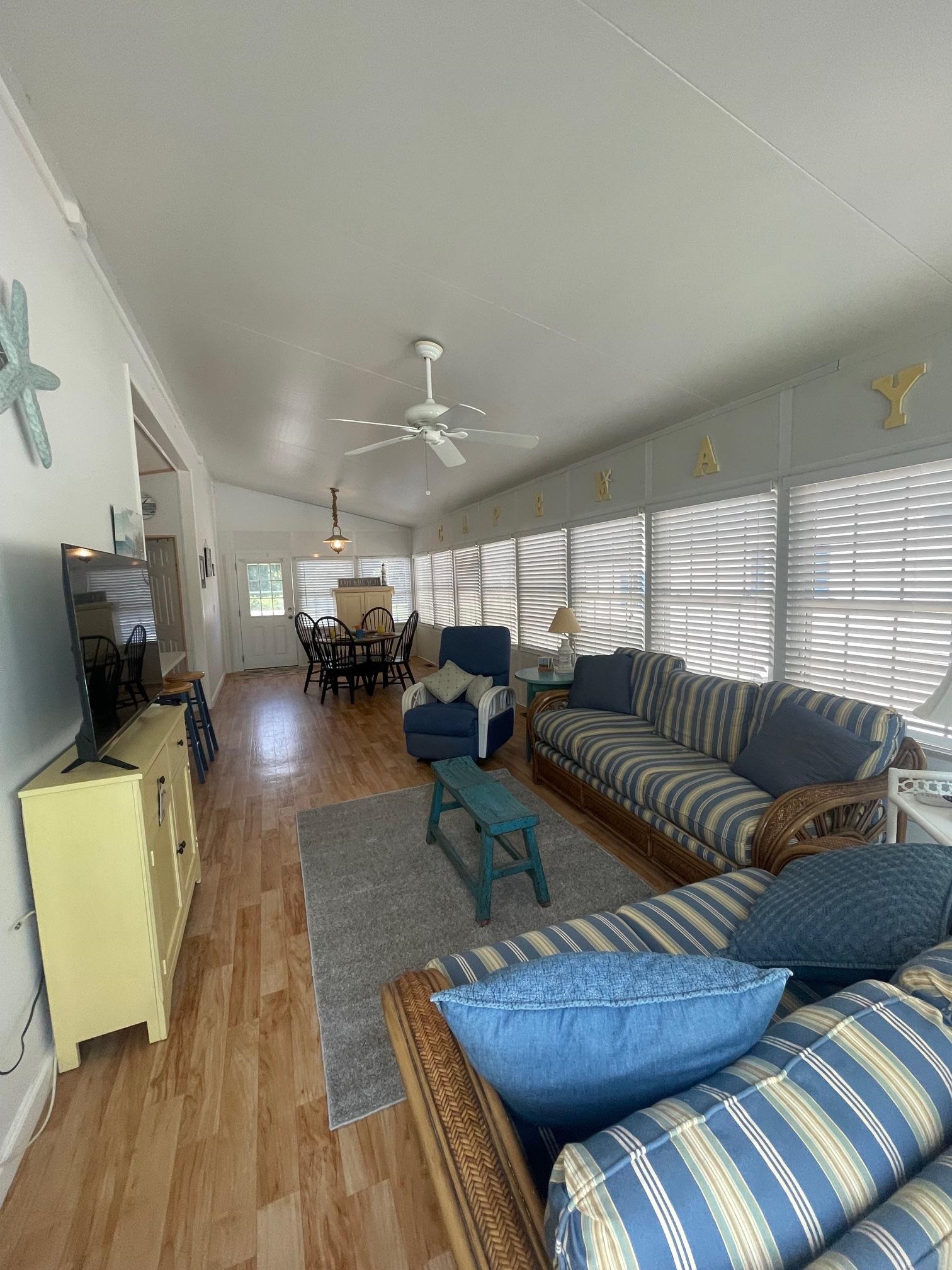 4100 Rte 9 South, Unit 9 Rio Grande, NJ 08242 - Photo 4 of 31 a living room with furniture and a wooden floor