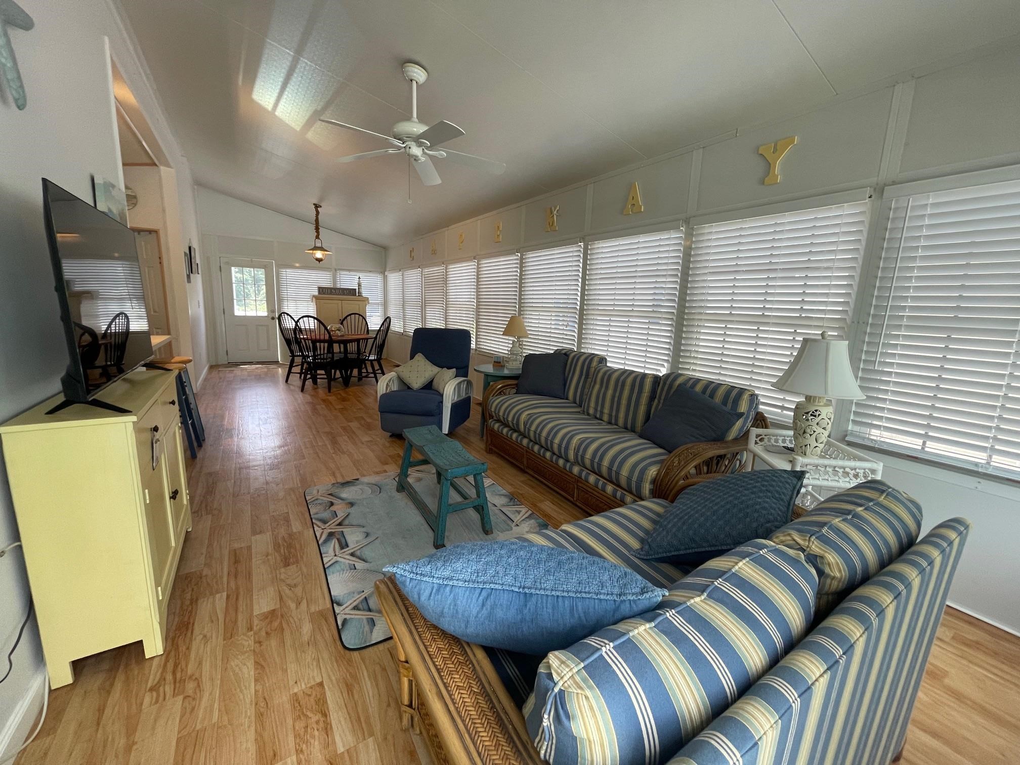 4100 Rte 9 South, Unit 9 Rio Grande, NJ 08242 - Photo 5 of 31 a living room with furniture and a flat screen tv
