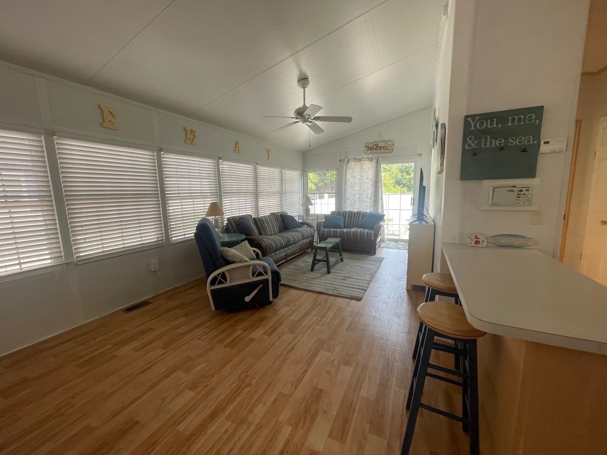 4100 Rte 9 South, Unit 9 Rio Grande, NJ 08242 - Photo 9 of 31 a living room with furniture and a large window