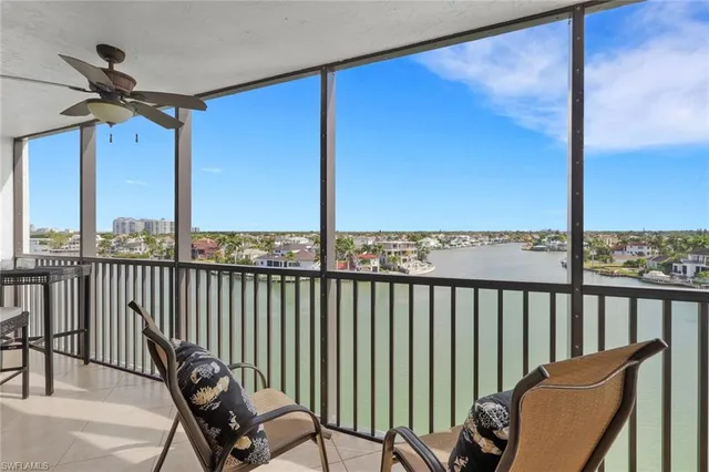 a view of roof deck with furniture