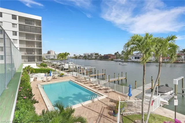 a view of a balcony with furniture
