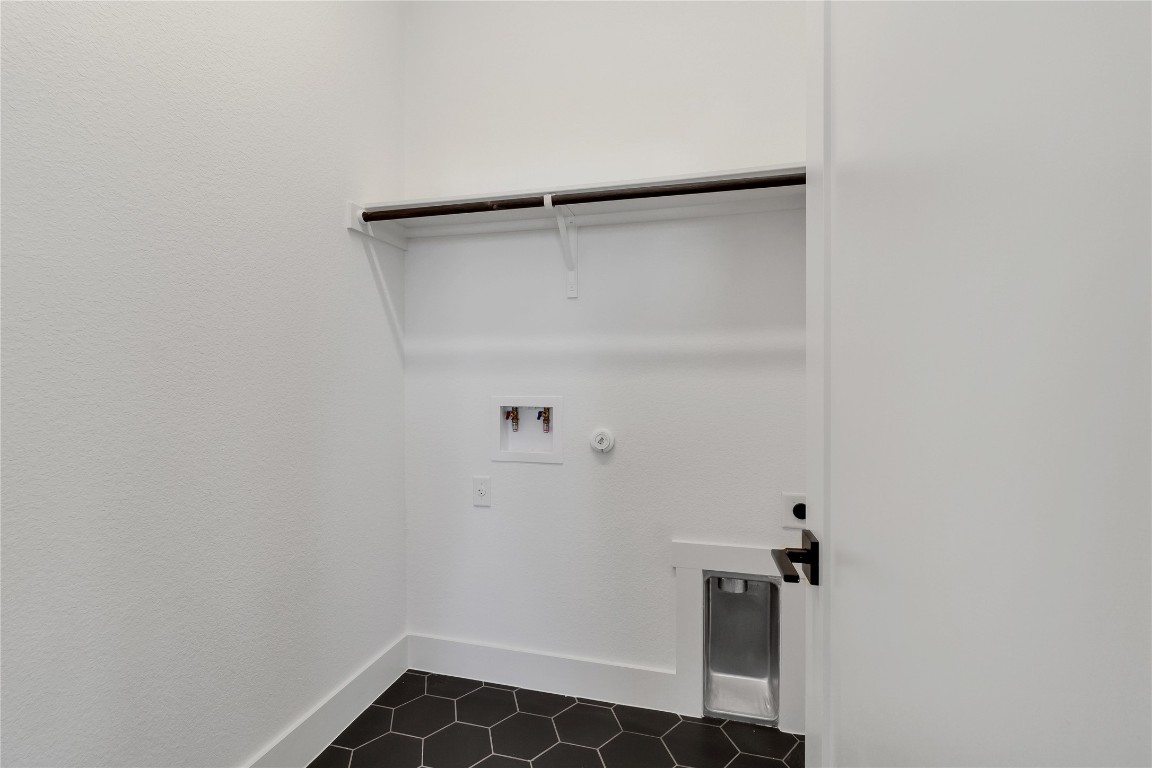 8589 Meridy Loop Round Rock, TX 78665 - Photo 18 of 36 a view of small space with racks on the wall