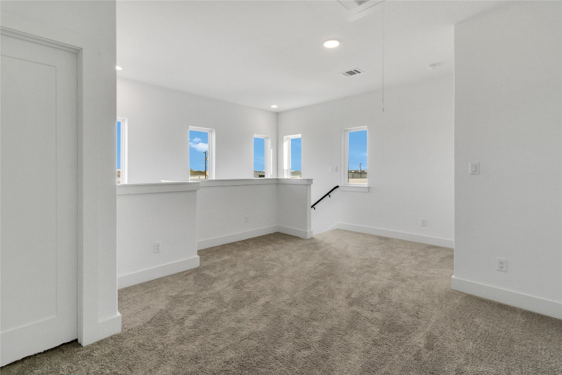 8589 Meridy Loop Round Rock, TX 78665 - Photo 28 of 36 a view of a kitchen with a sink and a cabinet