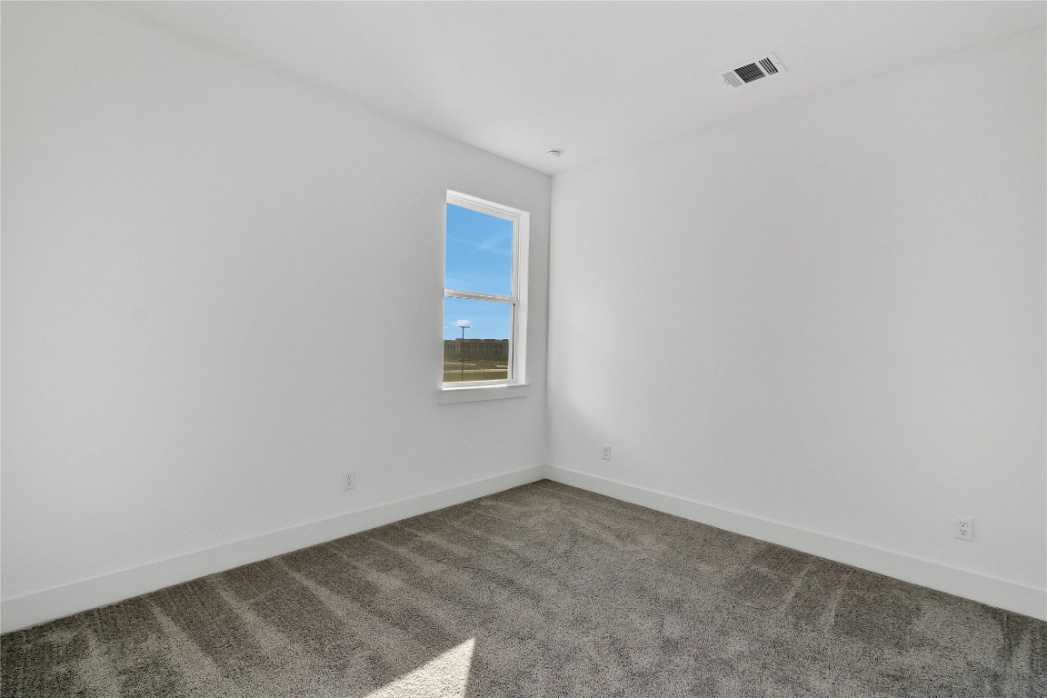 8589 Meridy Loop Round Rock, TX 78665 - Photo 30 of 36 an empty room with a window
