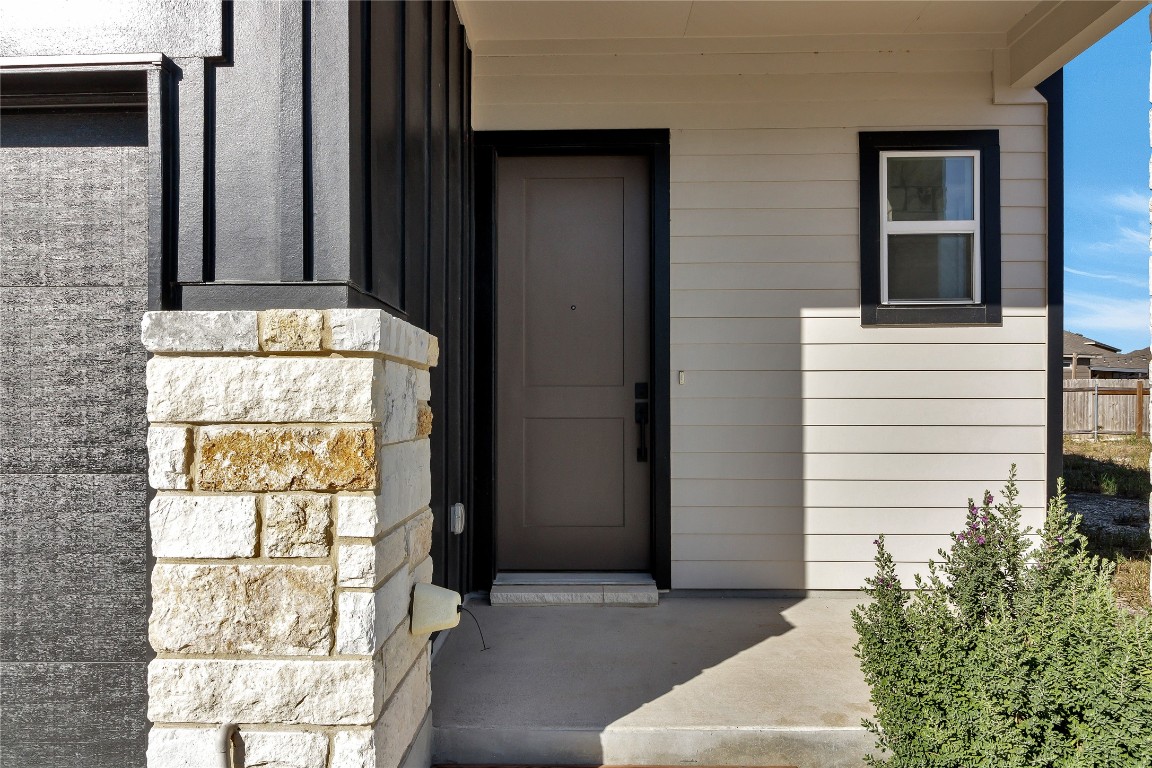 8589 Meridy Loop Round Rock, TX 78665 - Photo 5 of 36 a front view of a house with a yard