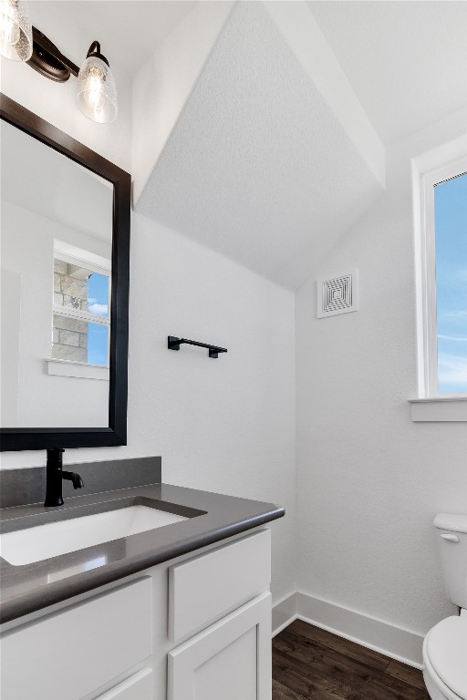 8589 Meridy Loop Round Rock, TX 78665 - Photo 8 of 36 a bathroom with a granite countertop sink and a toilet