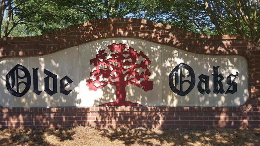 a sign that is on a brick wall