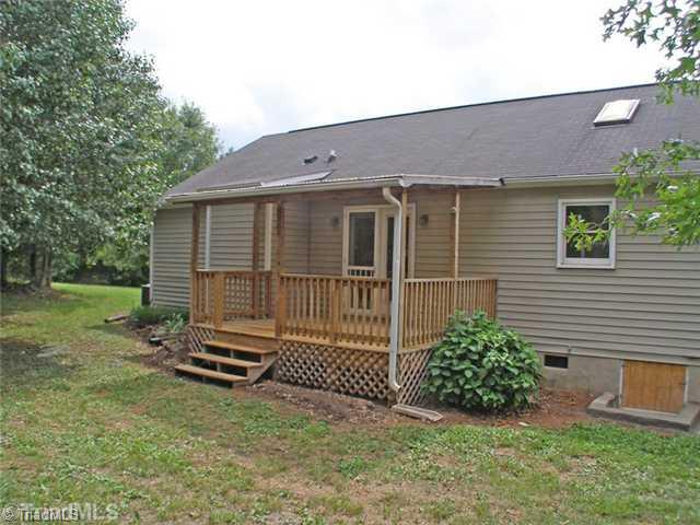8422 Mears Fork Road Summerfield, NC 27358 - Photo 14 of 16 Patio/Deck. Covered deck for enjoyment in all kinds of weather