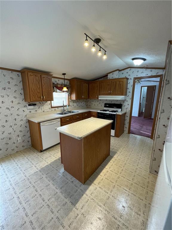 604 Deana Way Rochester, PA 15074 - Photo 7 of 25 a kitchen with stainless steel appliances granite countertop a stove top oven a sink a counter space and cabinets