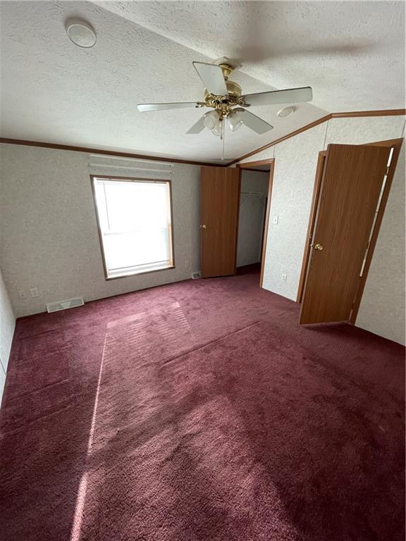 604 Deana Way Rochester, PA 15074 - Photo 8 of 25 an empty room with windows and fan