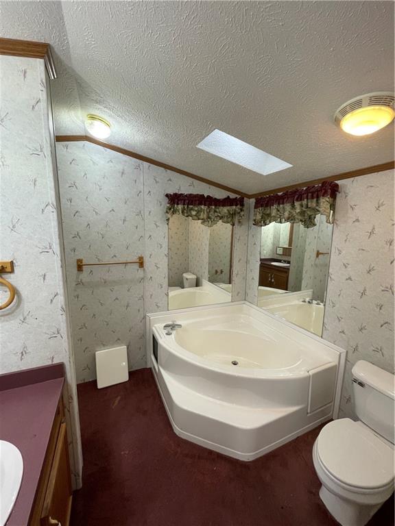 604 Deana Way Rochester, PA 15074 - Photo 10 of 25 a white bath tub sitting next to a white toilet