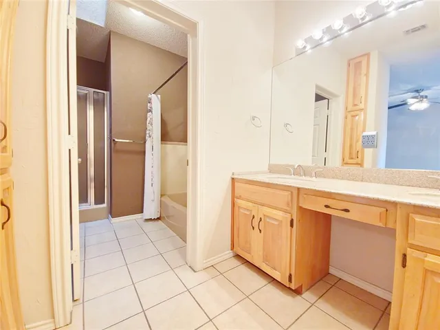 a view of a bathroom with a shower