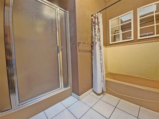 a view of an empty room and entryway