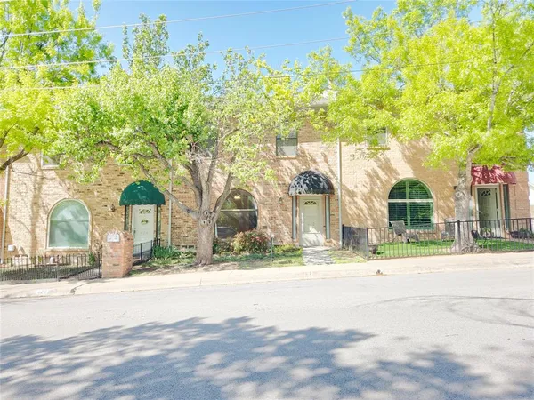 a view of city with tall buildings