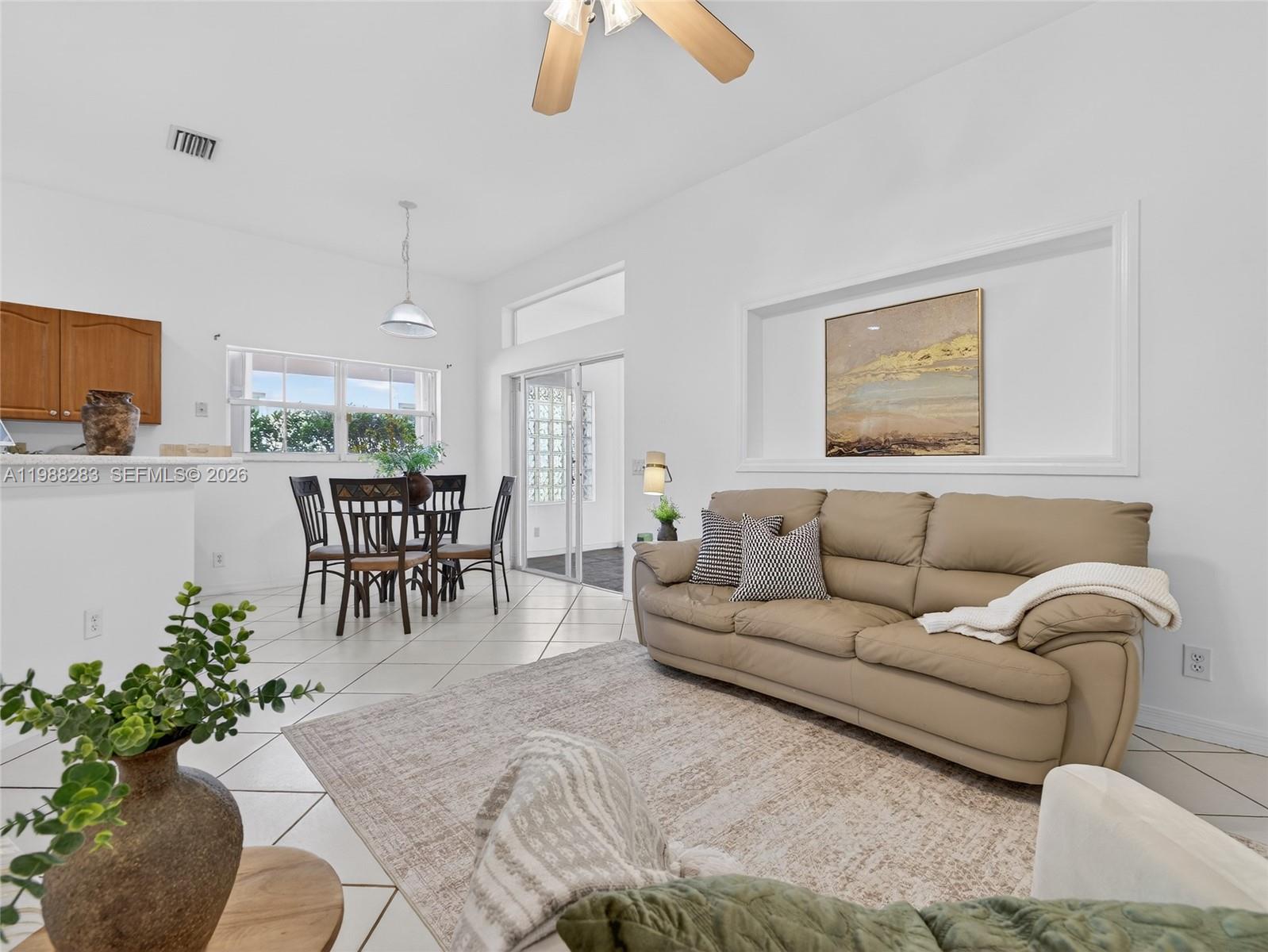 4317 Willow Ridge Drive Weston, FL 33331 - Photo 14 of 71 a living room with furniture and a potted plant