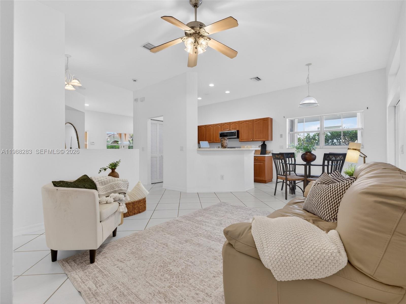 4317 Willow Ridge Drive Weston, FL 33331 - Photo 15 of 71 a living room with furniture and kitchen view