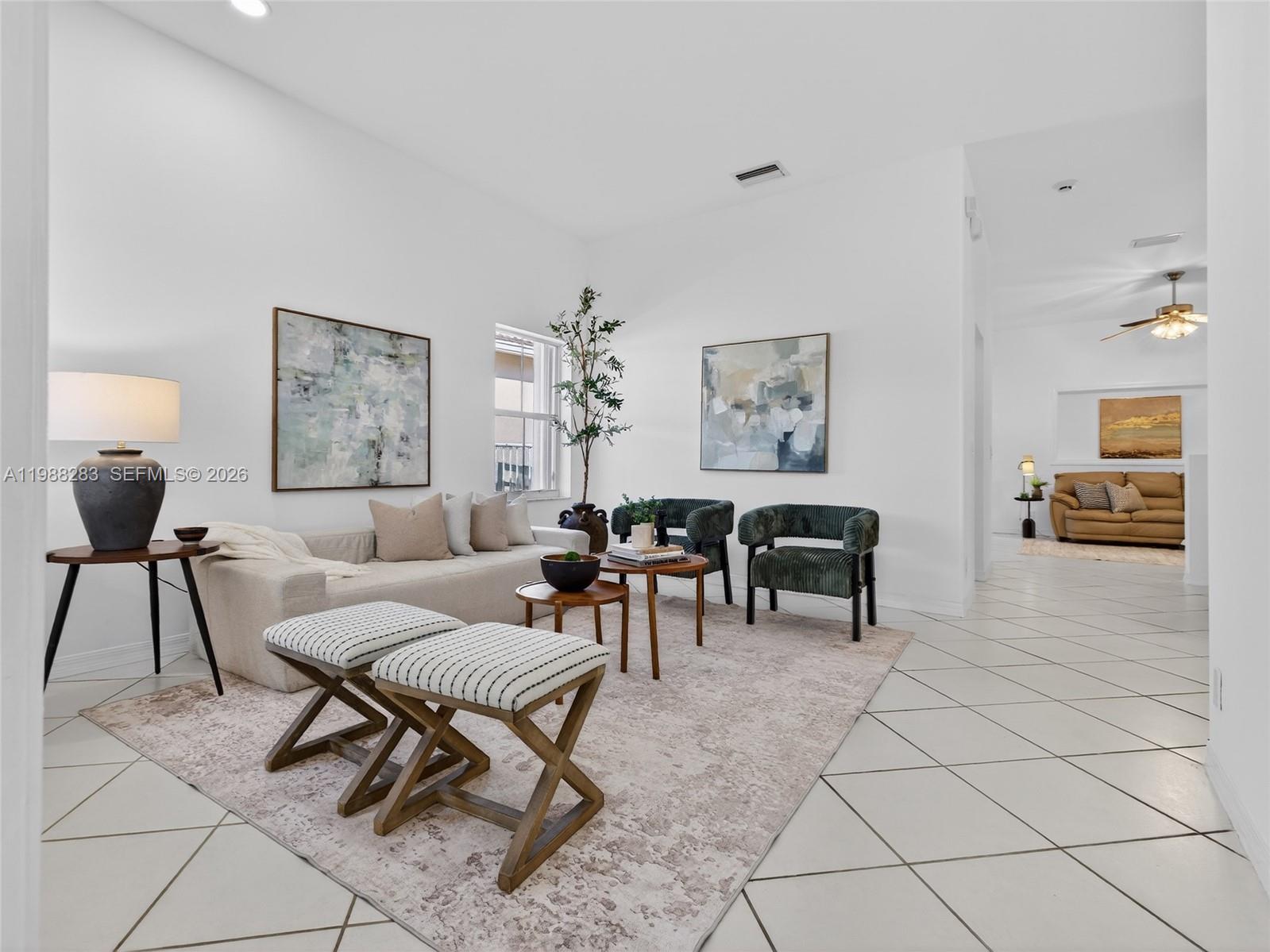 4317 Willow Ridge Drive Weston, FL 33331 - Photo 2 of 71 a living room with furniture and wooden floor