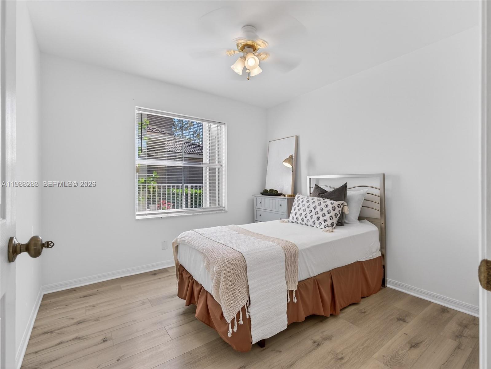 4317 Willow Ridge Drive Weston, FL 33331 - Photo 24 of 71 a bedroom with a bed and a window