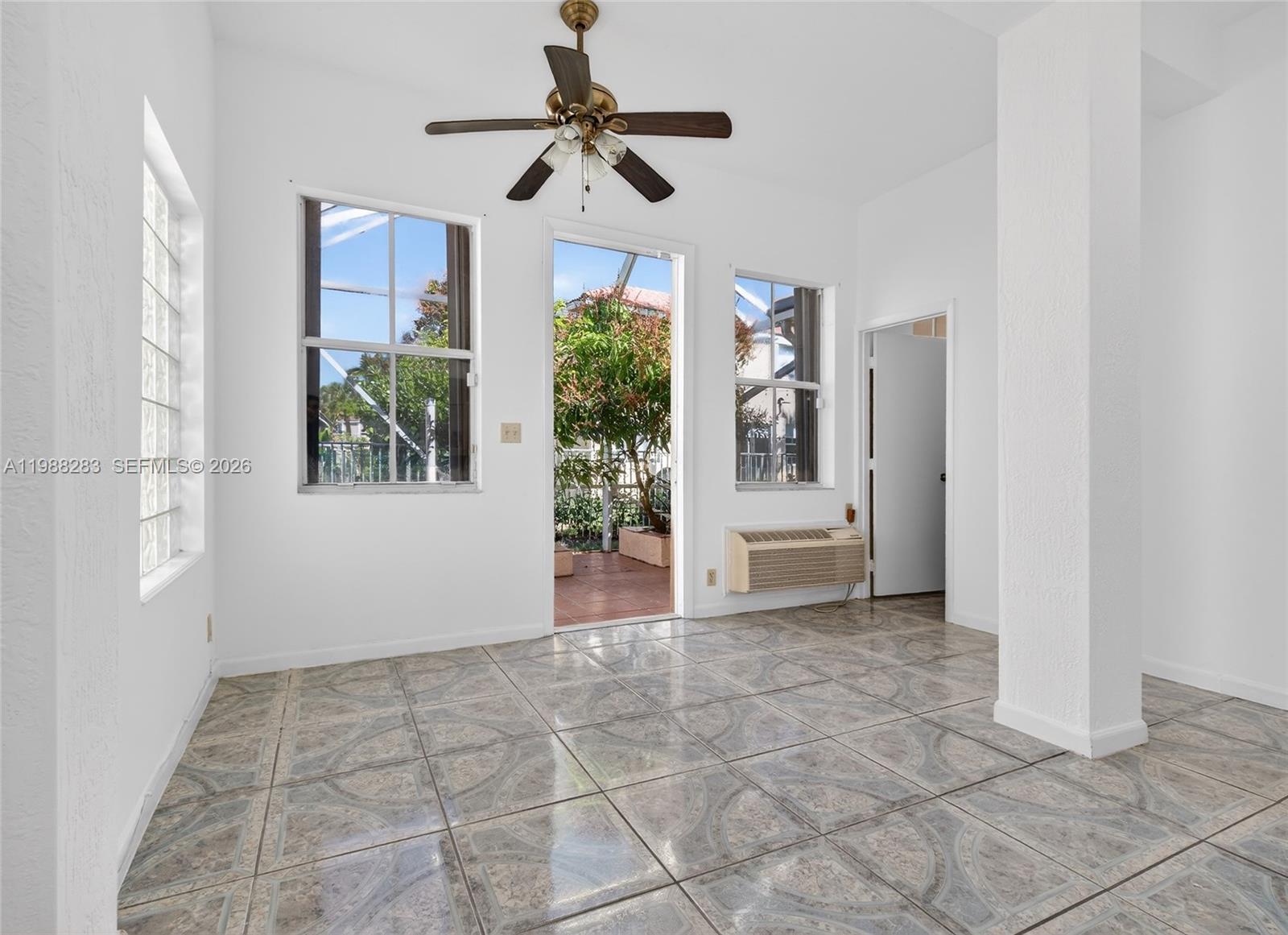 4317 Willow Ridge Drive Weston, FL 33331 - Photo 29 of 71 a view of an entryway with a chandelier