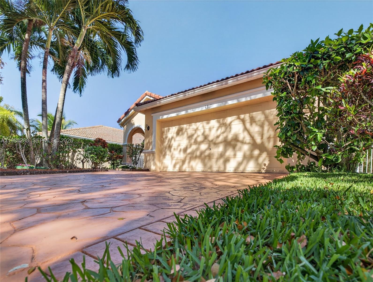 4317 Willow Ridge Drive Weston, FL 33331 - Photo 50 of 71 a view of a yard with an outdoor space
