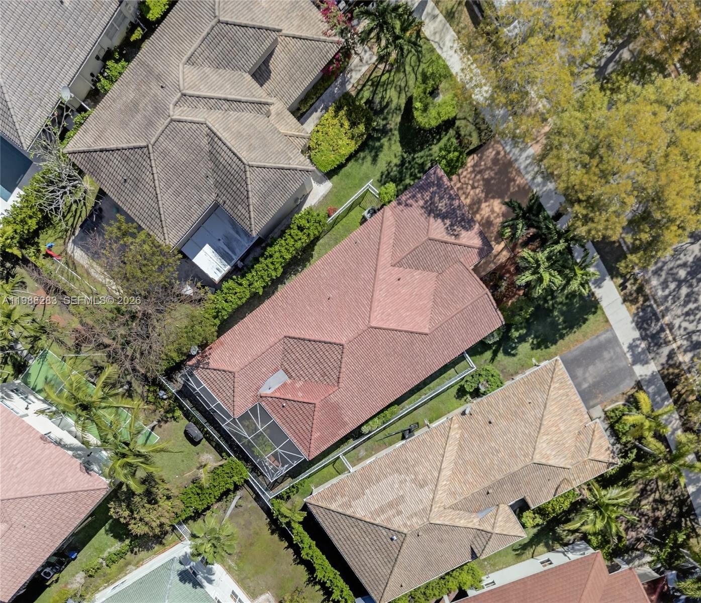 4317 Willow Ridge Drive Weston, FL 33331 - Photo 55 of 71 an aerial view of a house with a yard and a garage
