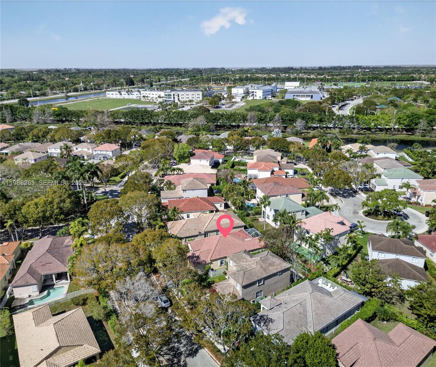4317 Willow Ridge Drive Weston, FL 33331 - Photo 57 of 71 an aerial view of residential houses with outdoor space and trees
