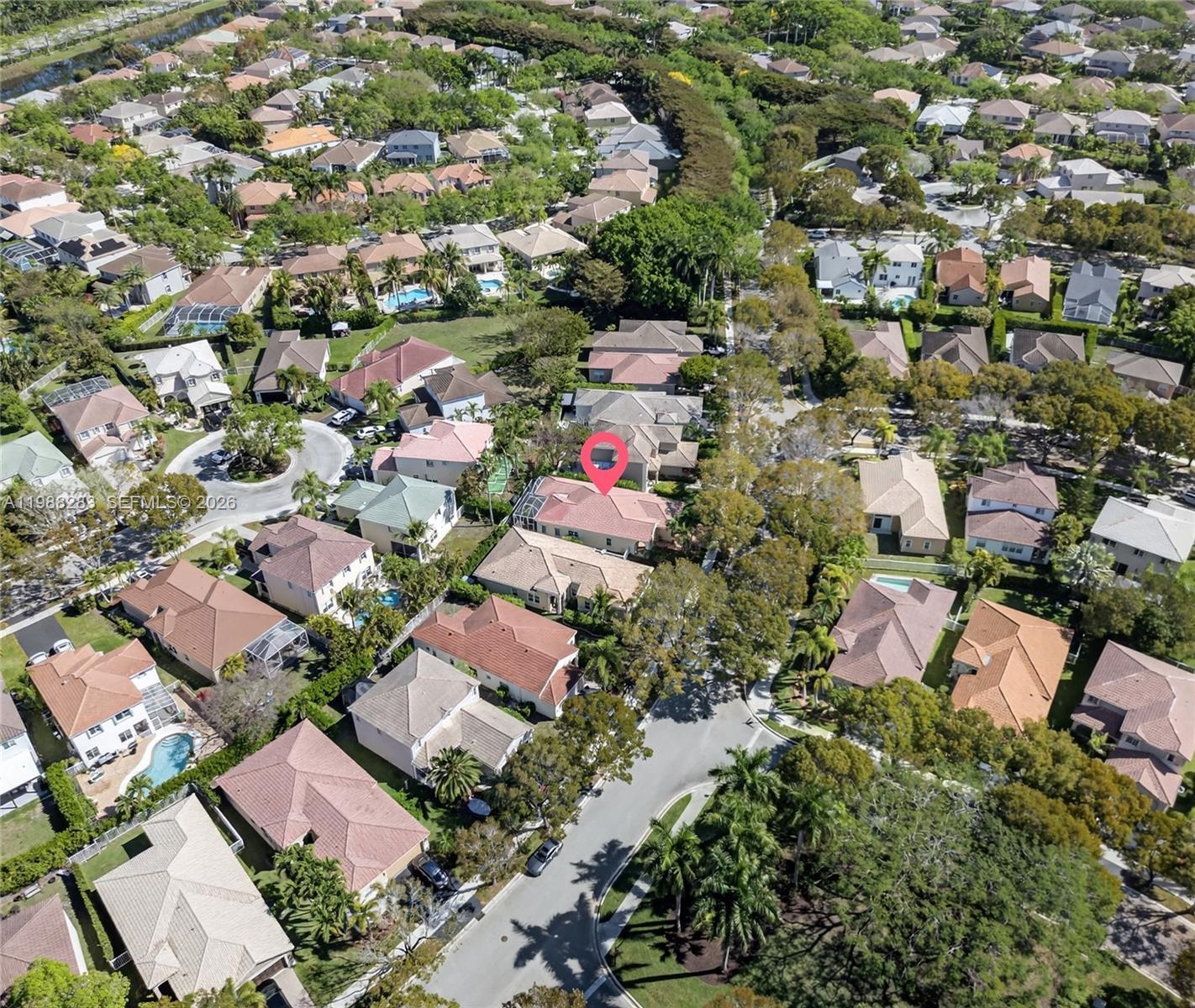 4317 Willow Ridge Drive Weston, FL 33331 - Photo 58 of 71 an aerial view of a city with lots of residential buildings
