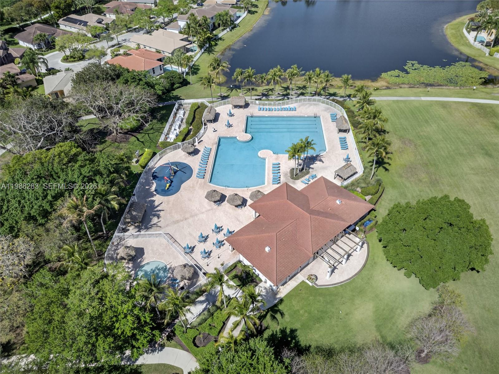 4317 Willow Ridge Drive Weston, FL 33331 - Photo 63 of 71 an aerial view of residential houses with outdoor space