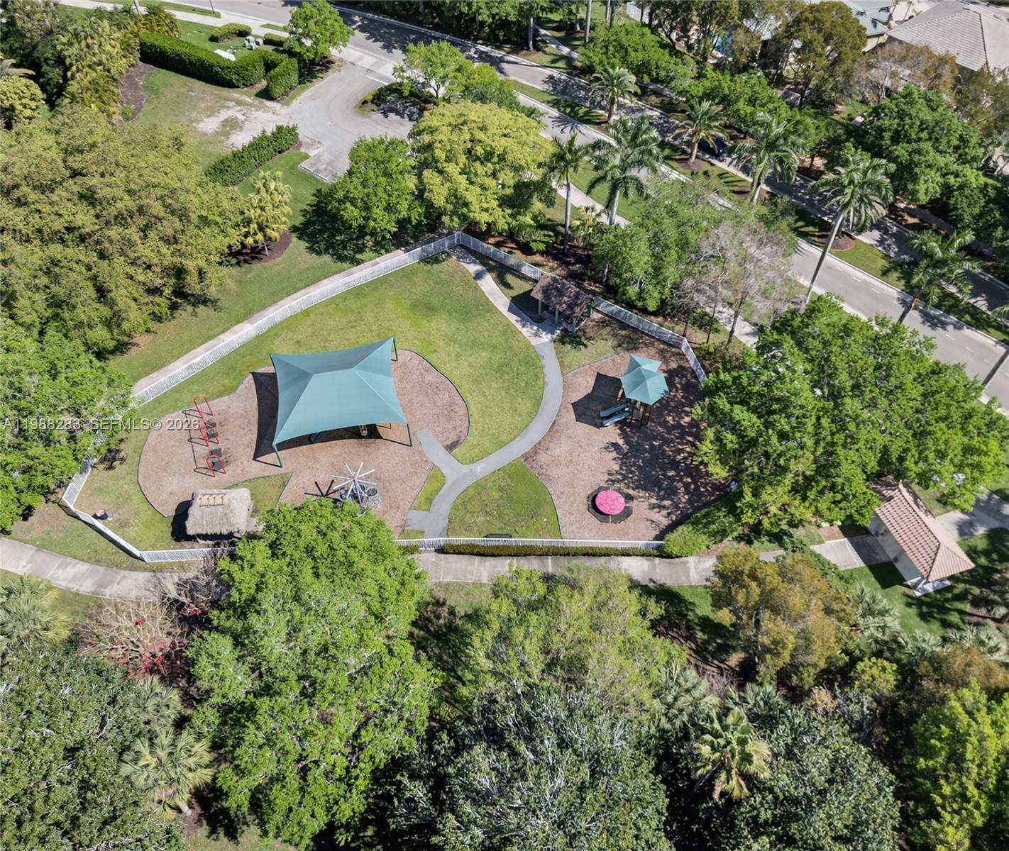 4317 Willow Ridge Drive Weston, FL 33331 - Photo 67 of 71 an aerial view of a house