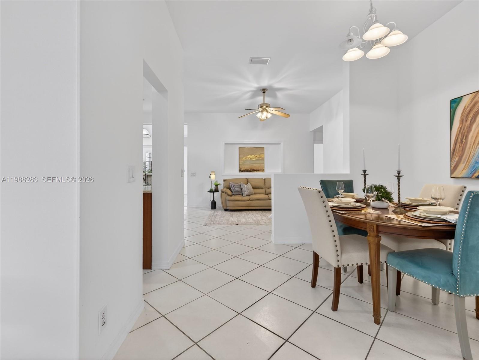 4317 Willow Ridge Drive Weston, FL 33331 - Photo 7 of 71 a view of a livingroom with furniture and chandelier