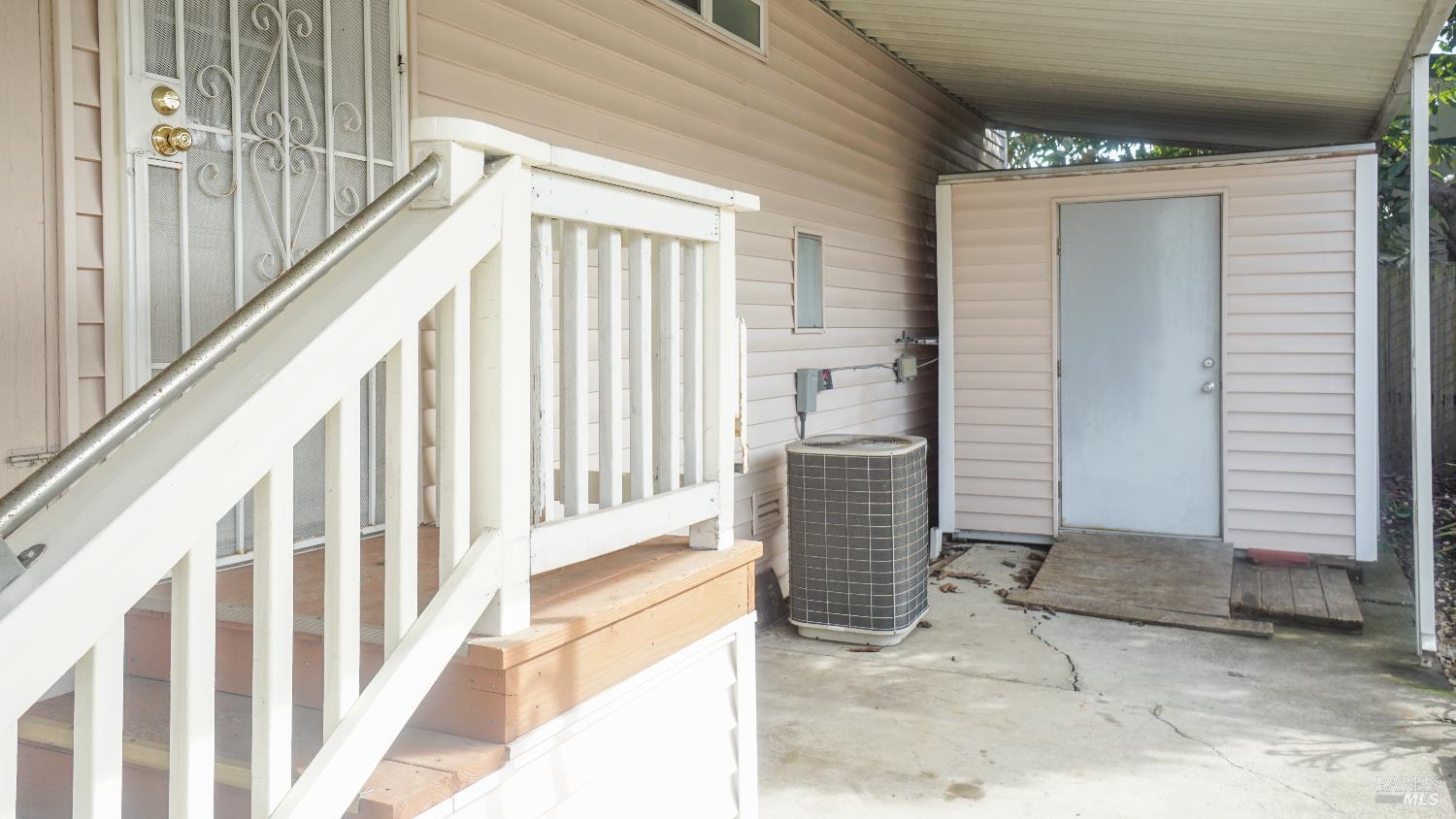 324 Aileen Avenue Santa Rosa, CA 95407 - Photo 19 of 21 Carport area with AC and shed