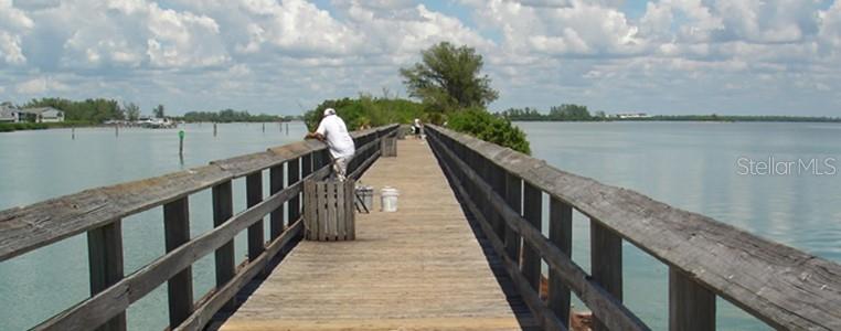 7232 Walcott Road Port Charlotte, FL 33981 - Photo 6 of 7 a view of balcony and lake