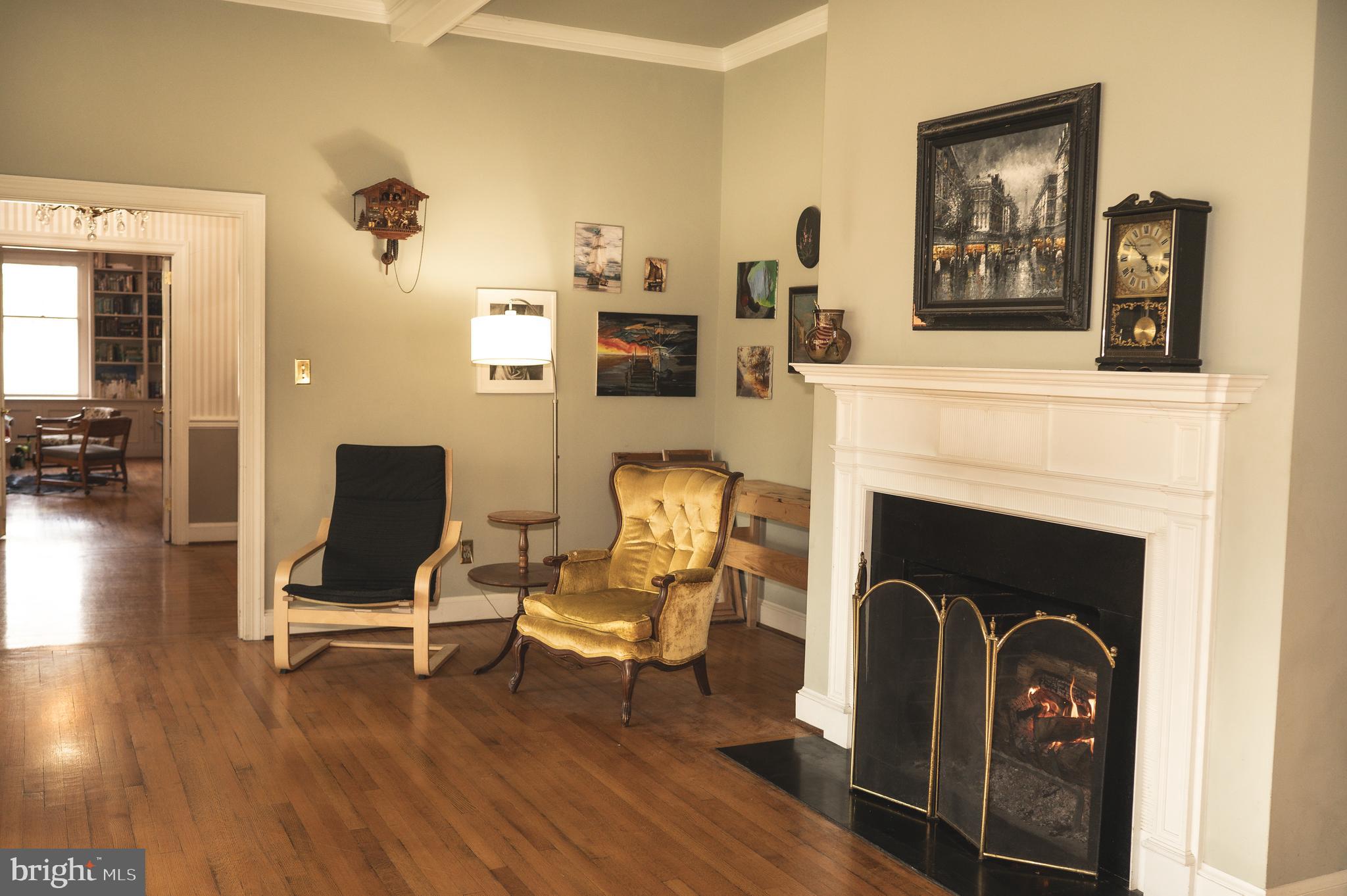 660 Country Club Road Culpeper, VA 22701 - Photo 11 of 69 a living room with furniture and a fireplace