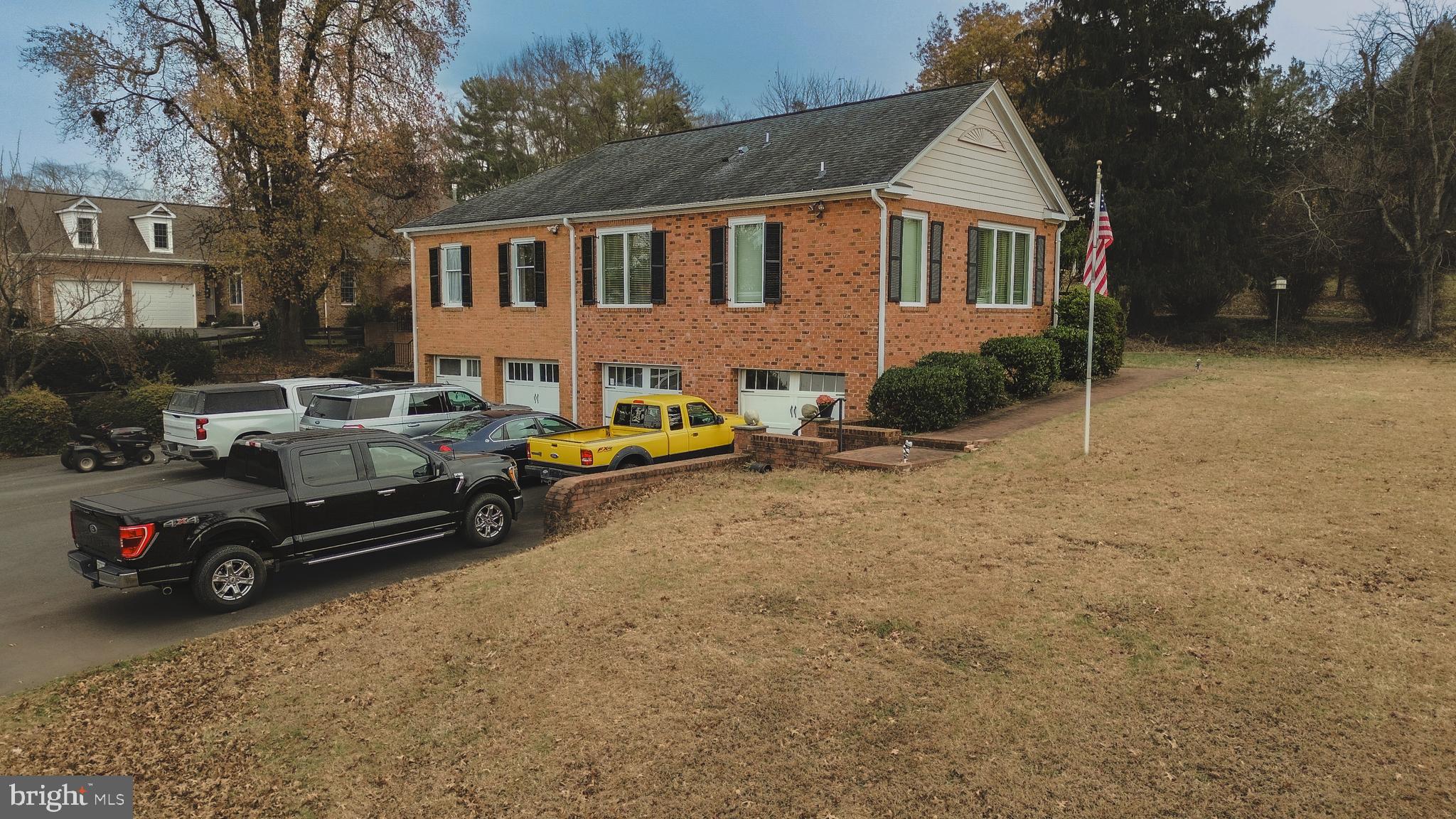 660 Country Club Road Culpeper, VA 22701 - Photo 2 of 69 a car parked in front of a house