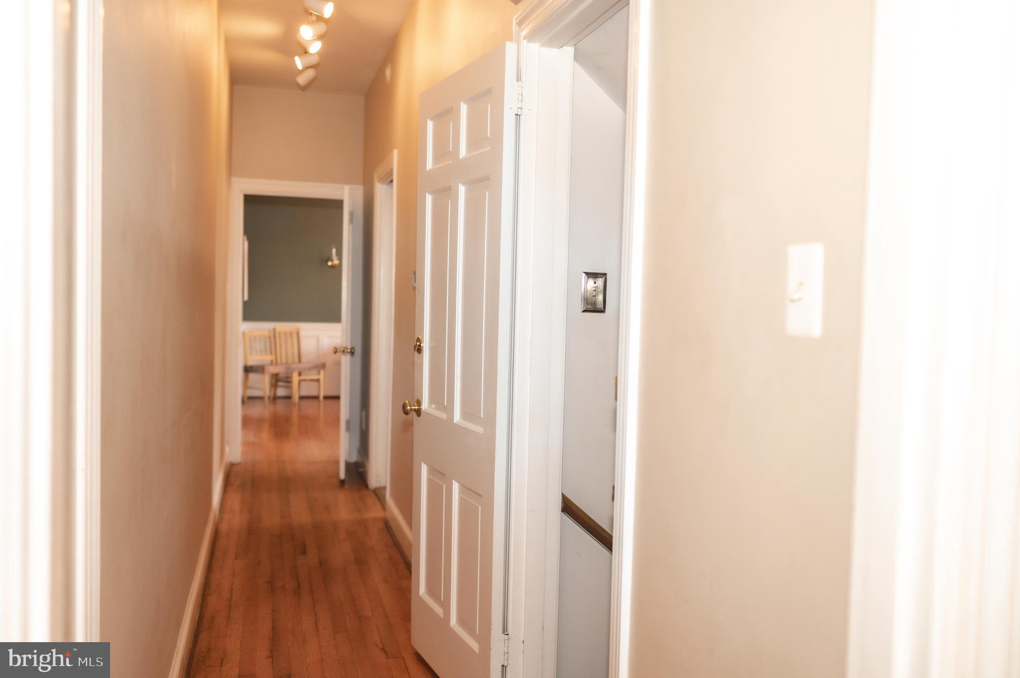 660 Country Club Road Culpeper, VA 22701 - Photo 21 of 69 a view of a hallway with wooden floor
