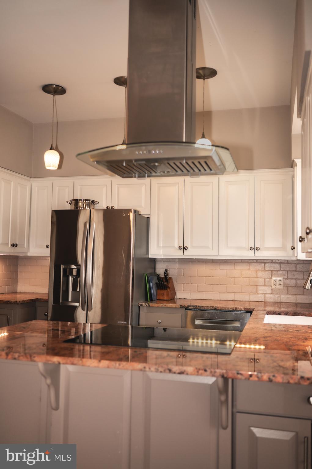 660 Country Club Road Culpeper, VA 22701 - Photo 25 of 69 a kitchen with stainless steel appliances granite countertop a sink and a refrigerator