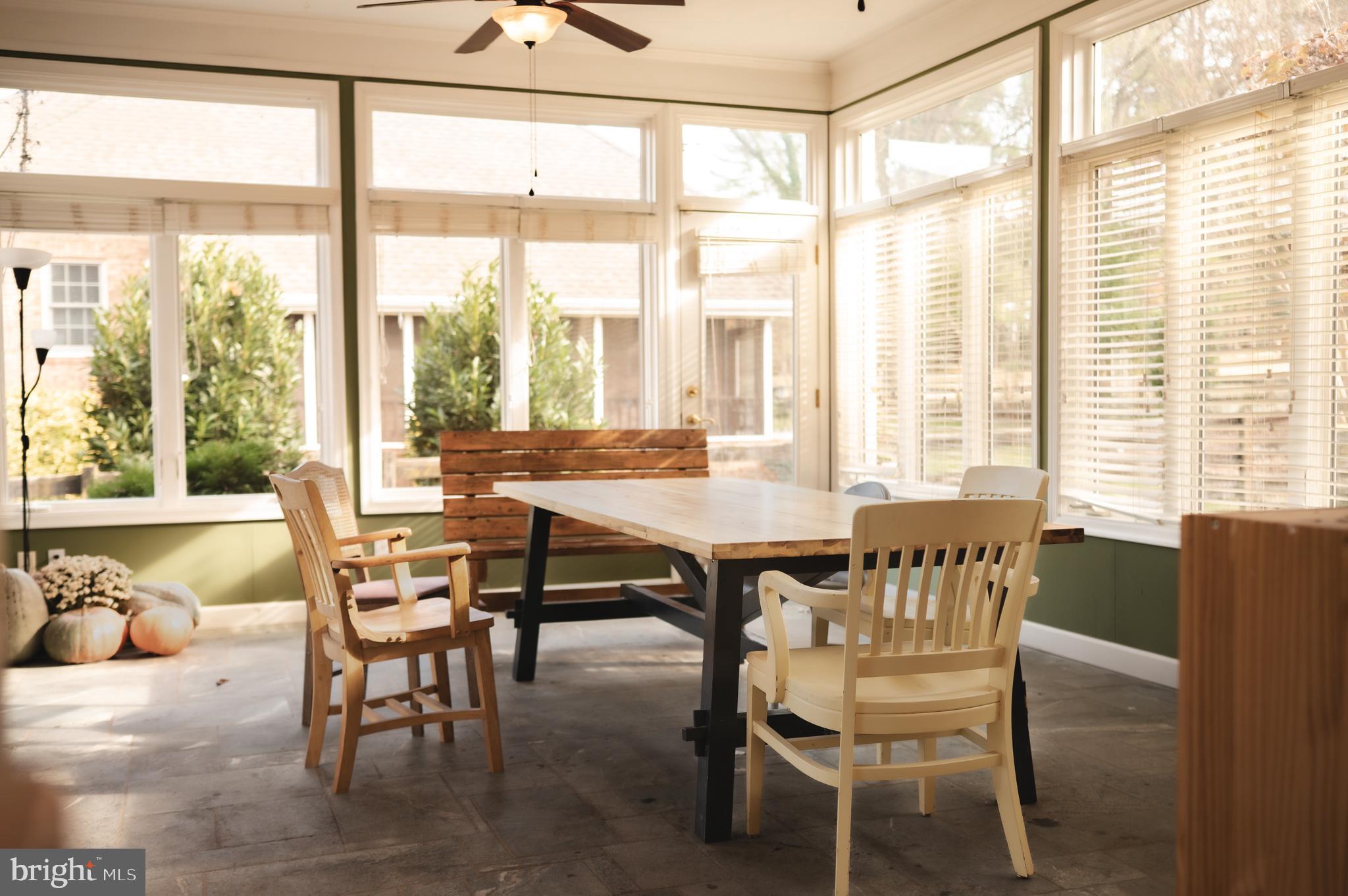 660 Country Club Road Culpeper, VA 22701 - Photo 29 of 69 a dining room with furniture and large windows