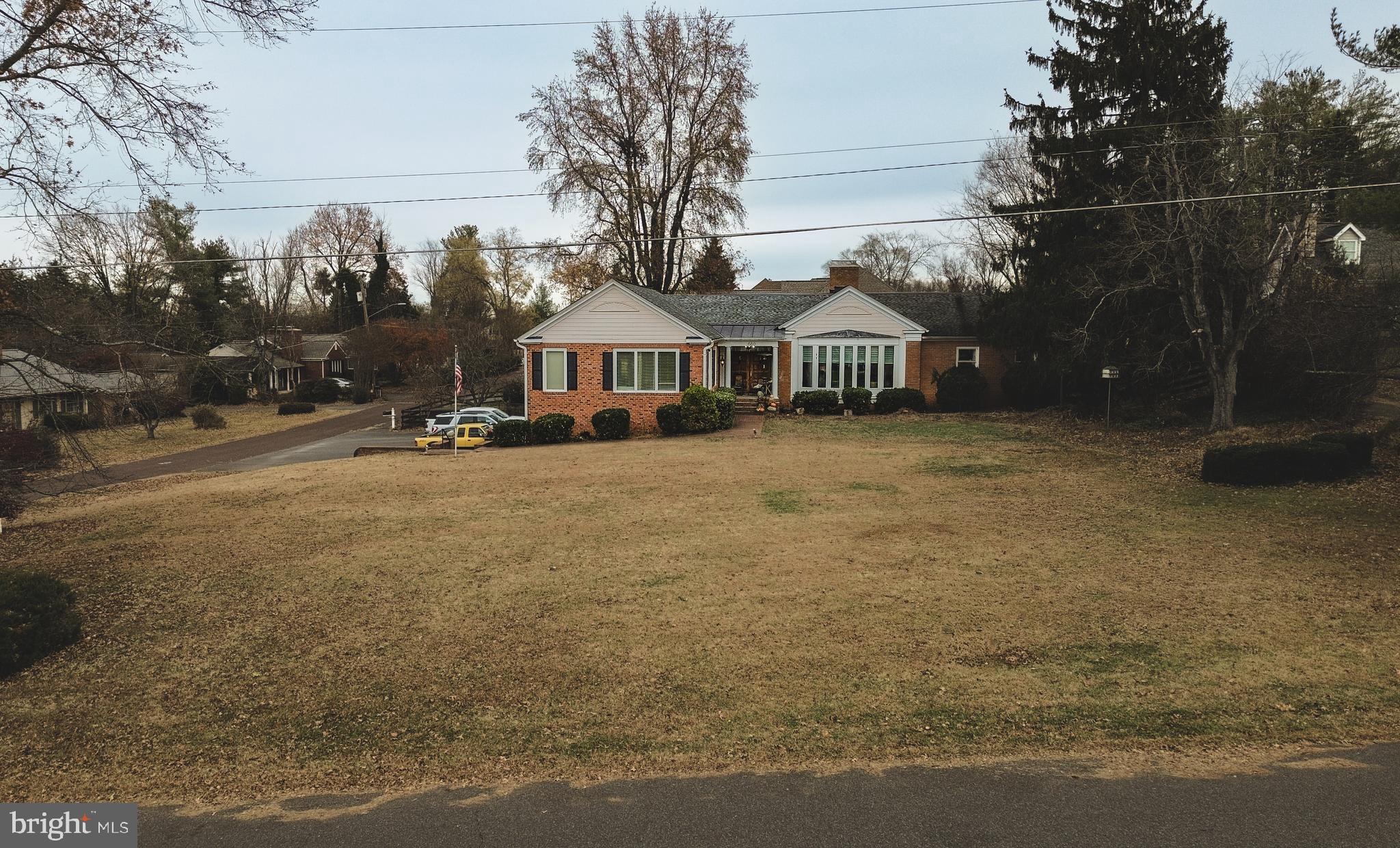 660 Country Club Road Culpeper, VA 22701 - Photo 67 of 69 a front view of a house with a yard and trees