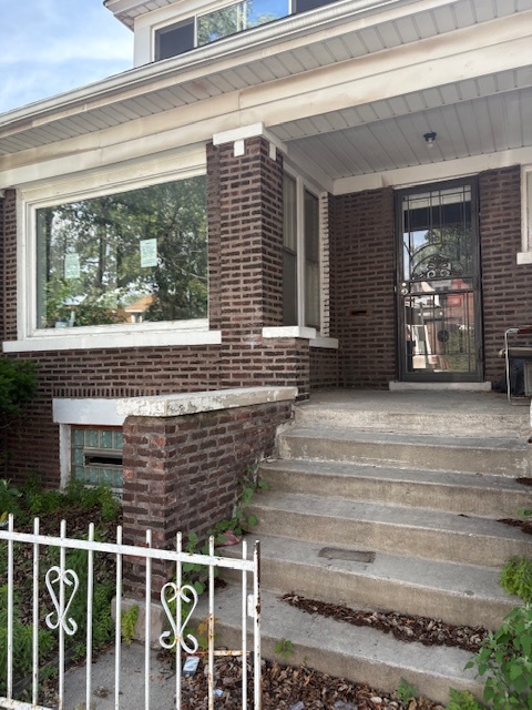 7744 South Rhodes Avenue Chicago, IL 60619 - Photo 2 of 14 a view of front door