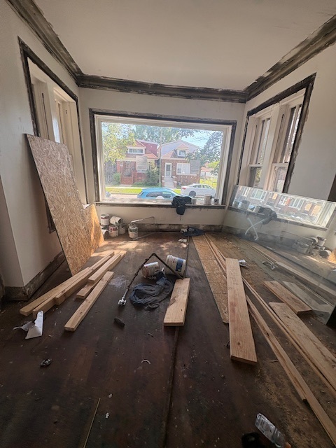 7744 South Rhodes Avenue Chicago, IL 60619 - Photo 3 of 14 a view of a room with gym equipment