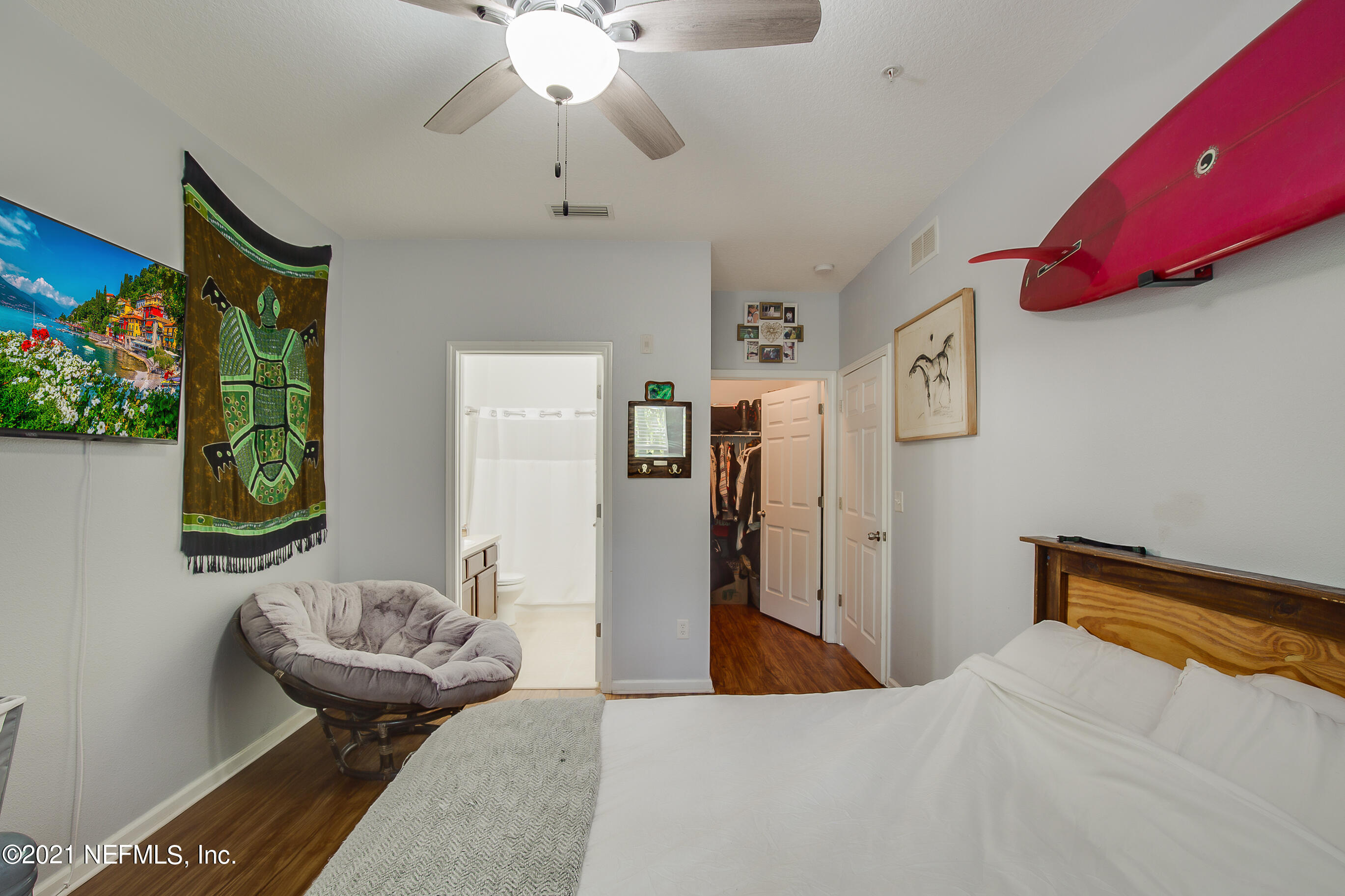 a bedroom with bed and window