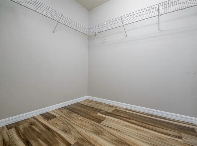 a view of a room with racks on the wall